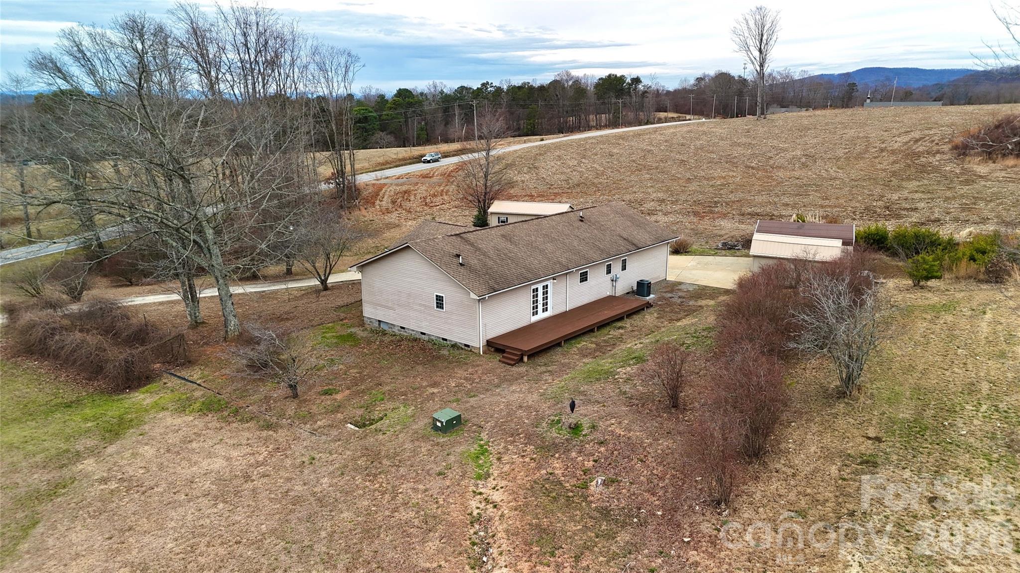 12087 Traphill Road Traphill, NC 28685 - Photo 3 of 40 a view of a terrace with a lake view