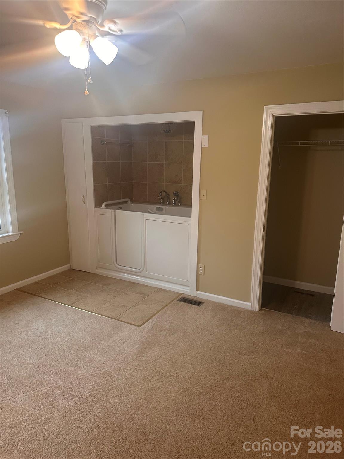 12087 Traphill Road Traphill, NC 28685 - Photo 33 of 40 a view of an empty room with a window
