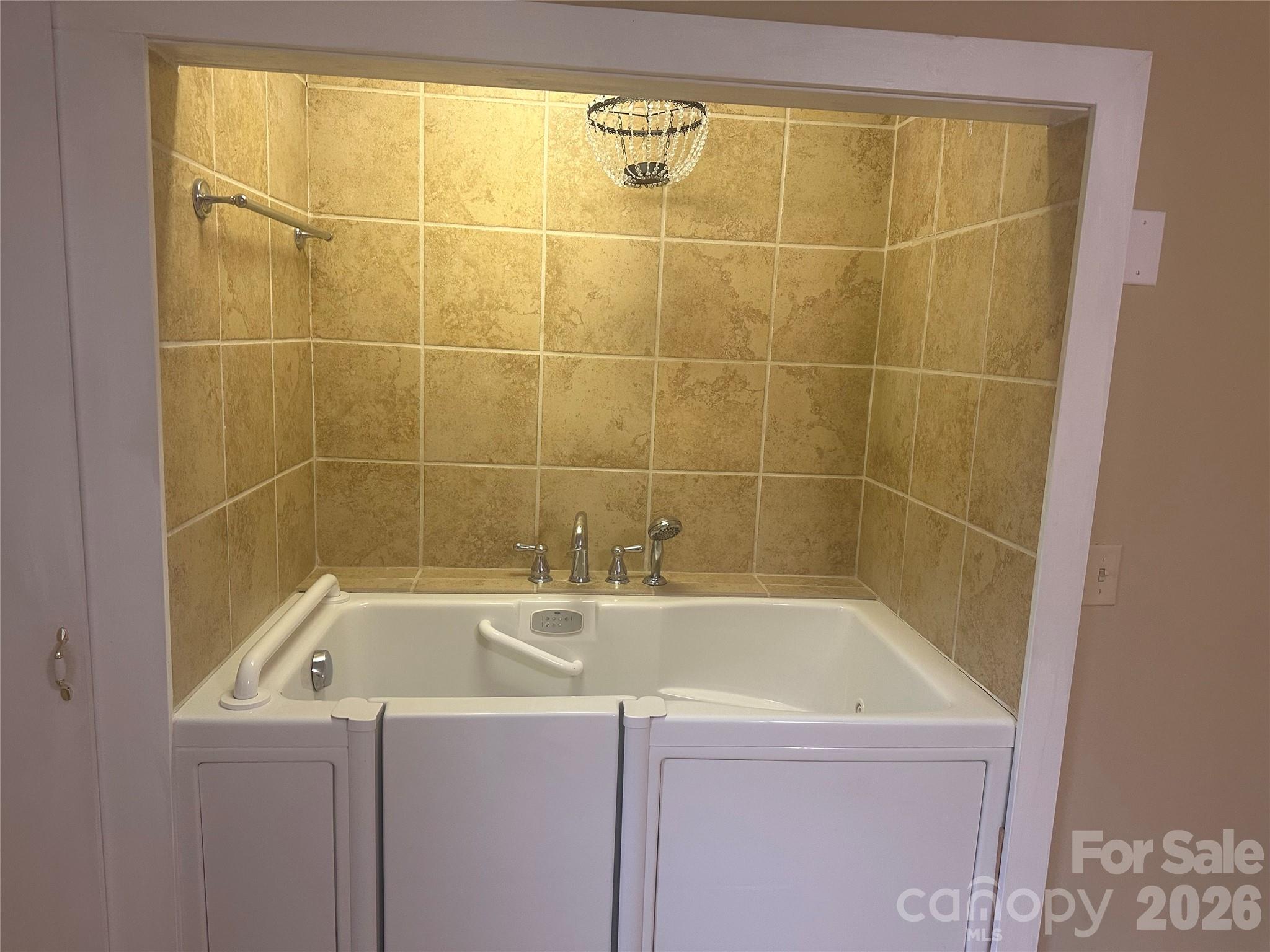 12087 Traphill Road Traphill, NC 28685 - Photo 34 of 40 a bathroom with a bathtub