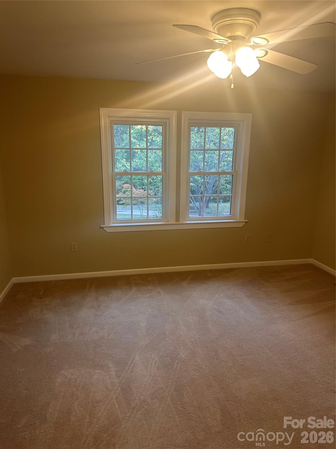 12087 Traphill Road Traphill, NC 28685 - Photo 36 of 40 a view of an empty room with a window