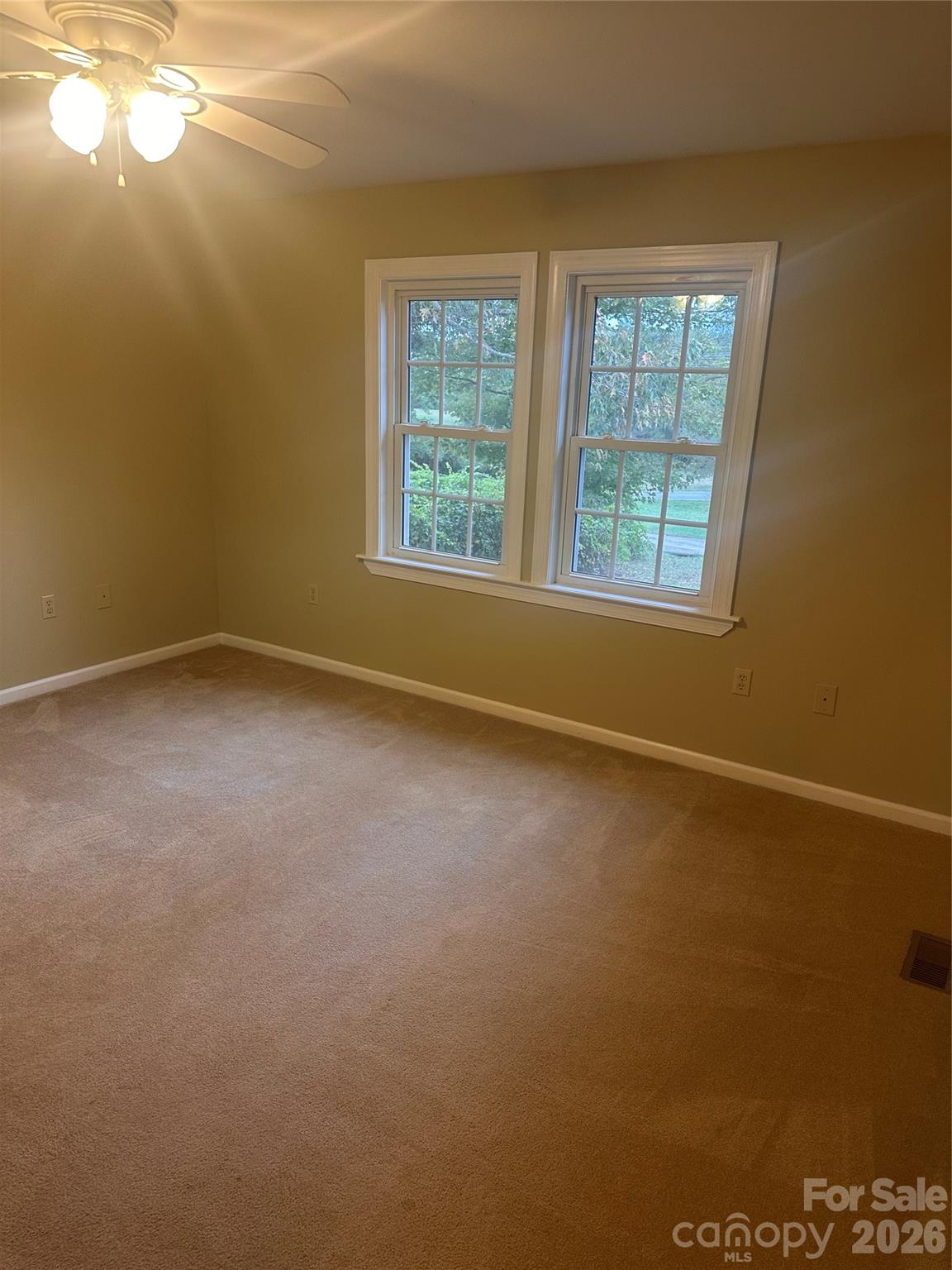 12087 Traphill Road Traphill, NC 28685 - Photo 39 of 40 an empty room with a window