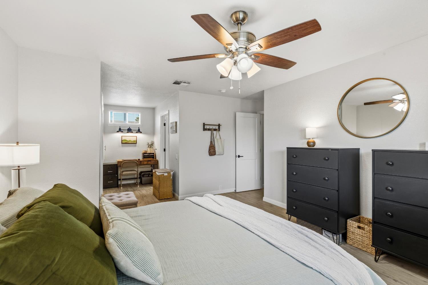2841 Fowler Road, Unit 89 Ceres, CA 95307 - Photo 13 of 32 a bedroom with a bed and wooden floor