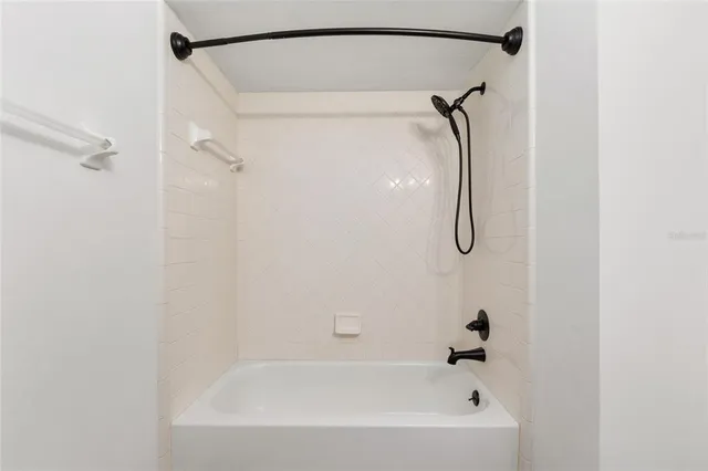 a front view of a house with a yard and a garage