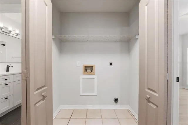 an aerial view of a city with lake view