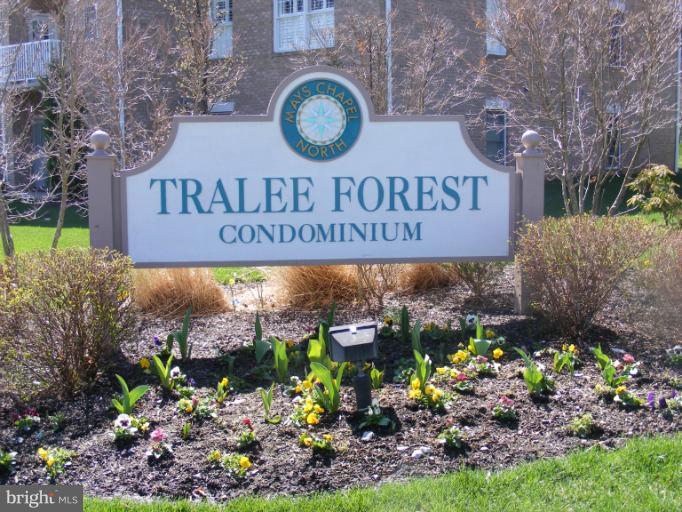 12000 Tralee Road, Unit 304 Lutherville-Timonium, MD 21093 - Photo 5 of 9 a sign on the side of a building