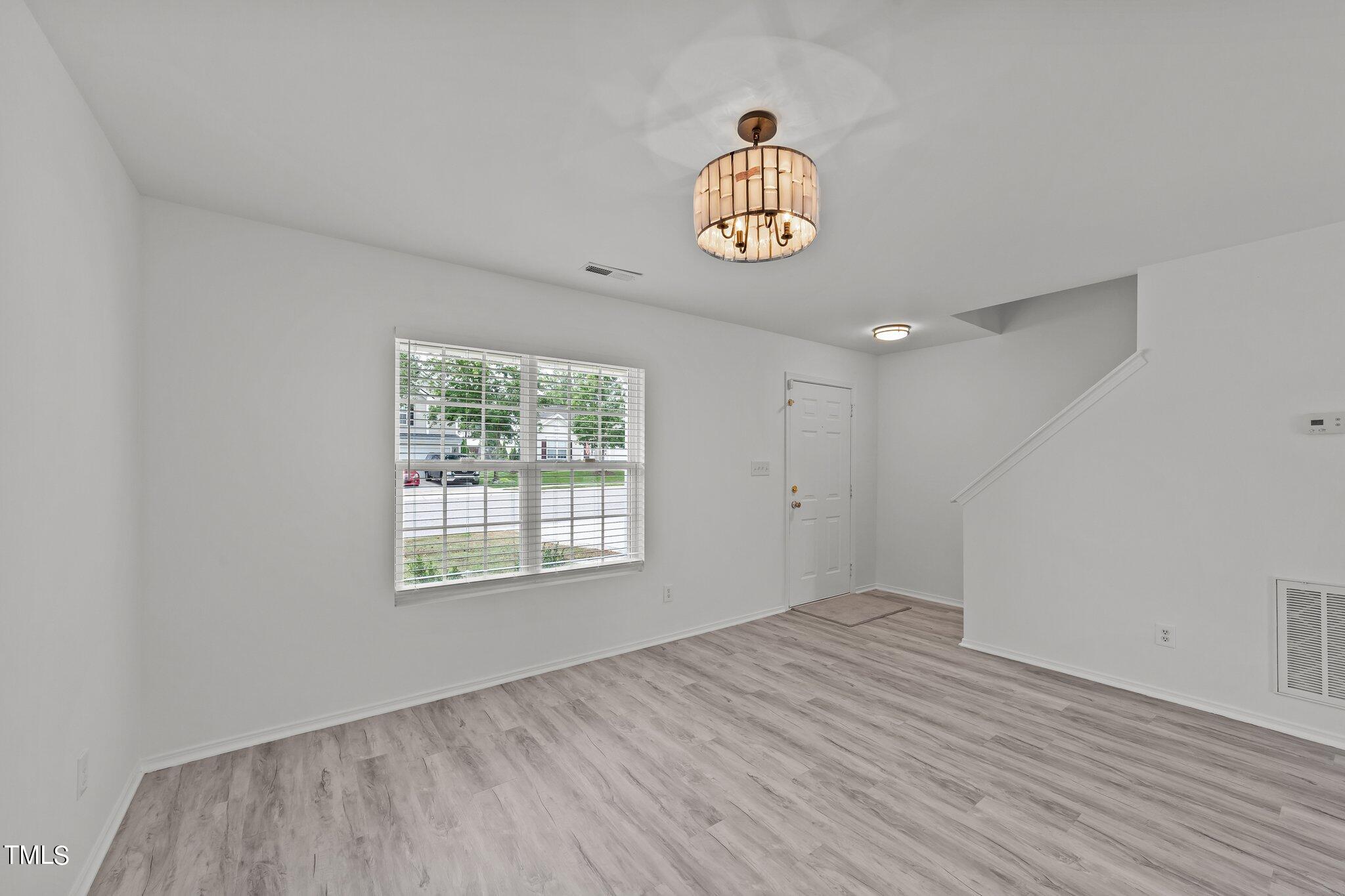 5357 Thunderidge Drive Raleigh, NC 27610 - Photo 7 of 54 Foyer/Formal Dining Room