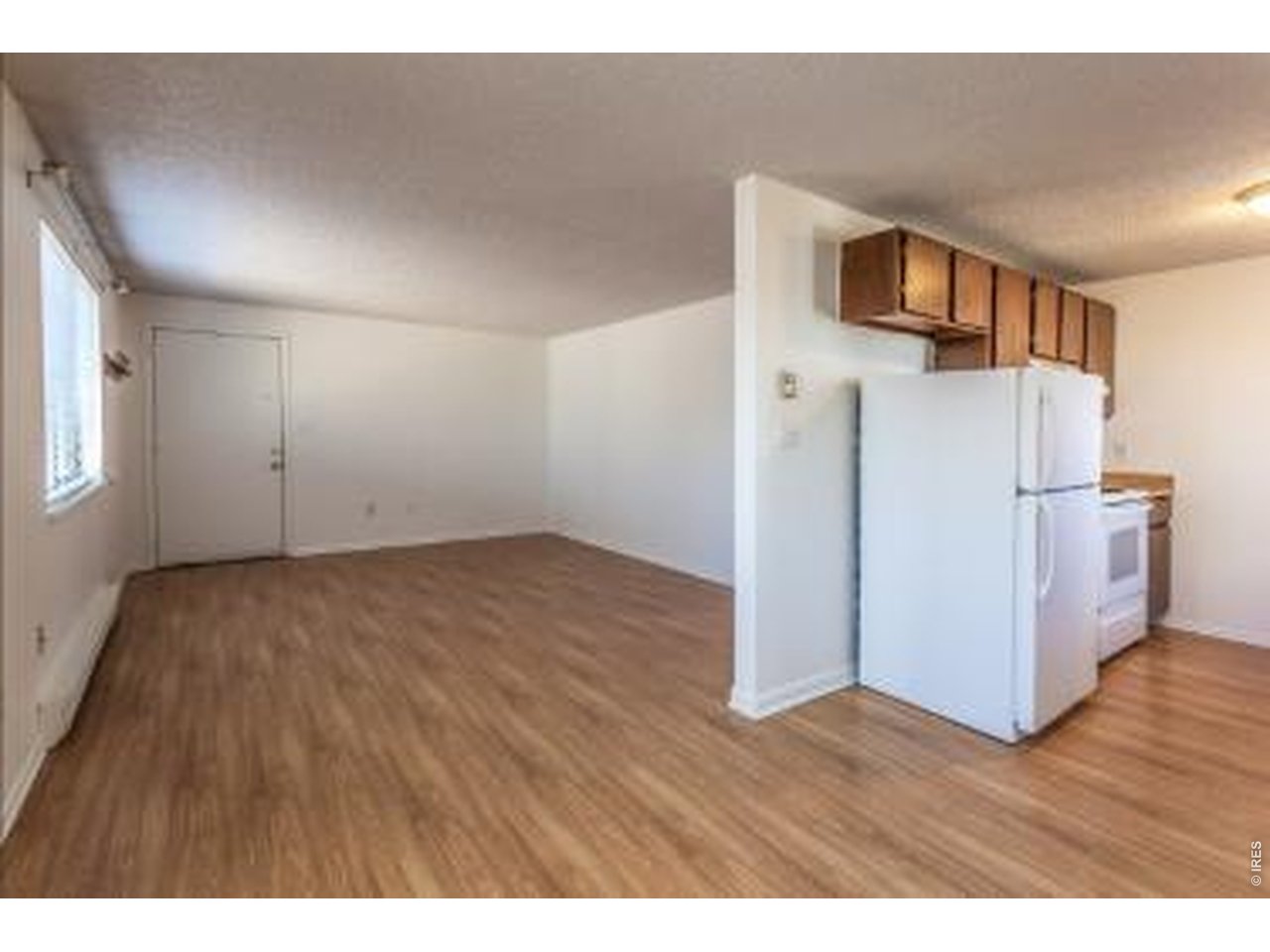 1244 Maple Street Fort Collins, CO 80521 - Photo 3 of 10 Living room/kitchen