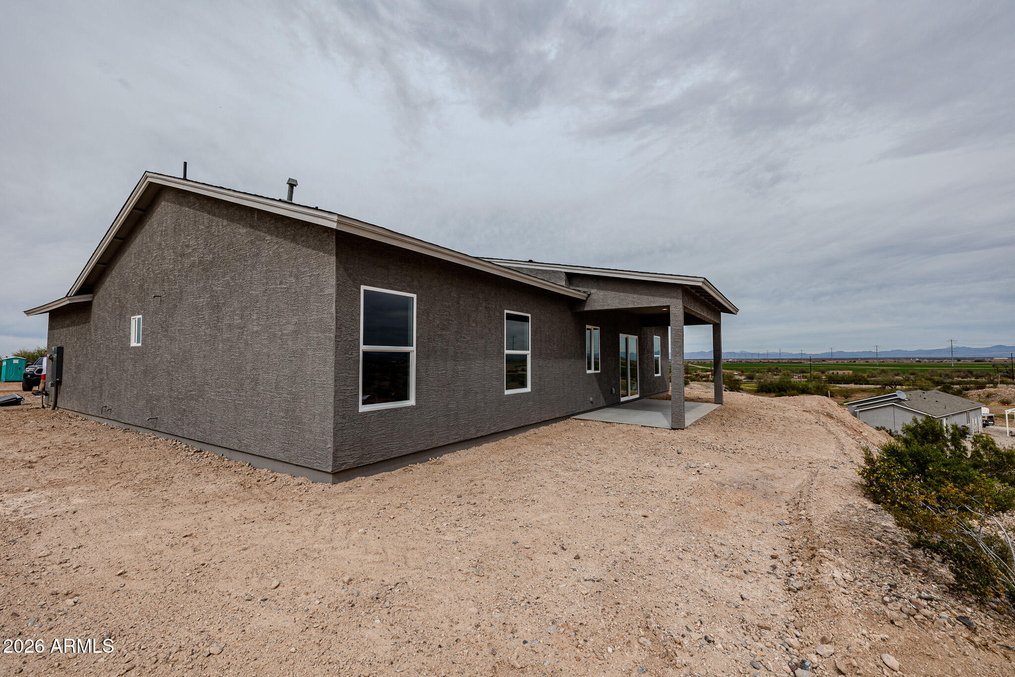 11459 East Adamsville Road Florence, AZ 85132 - Photo 44 of 63 a house view with a backyard space
