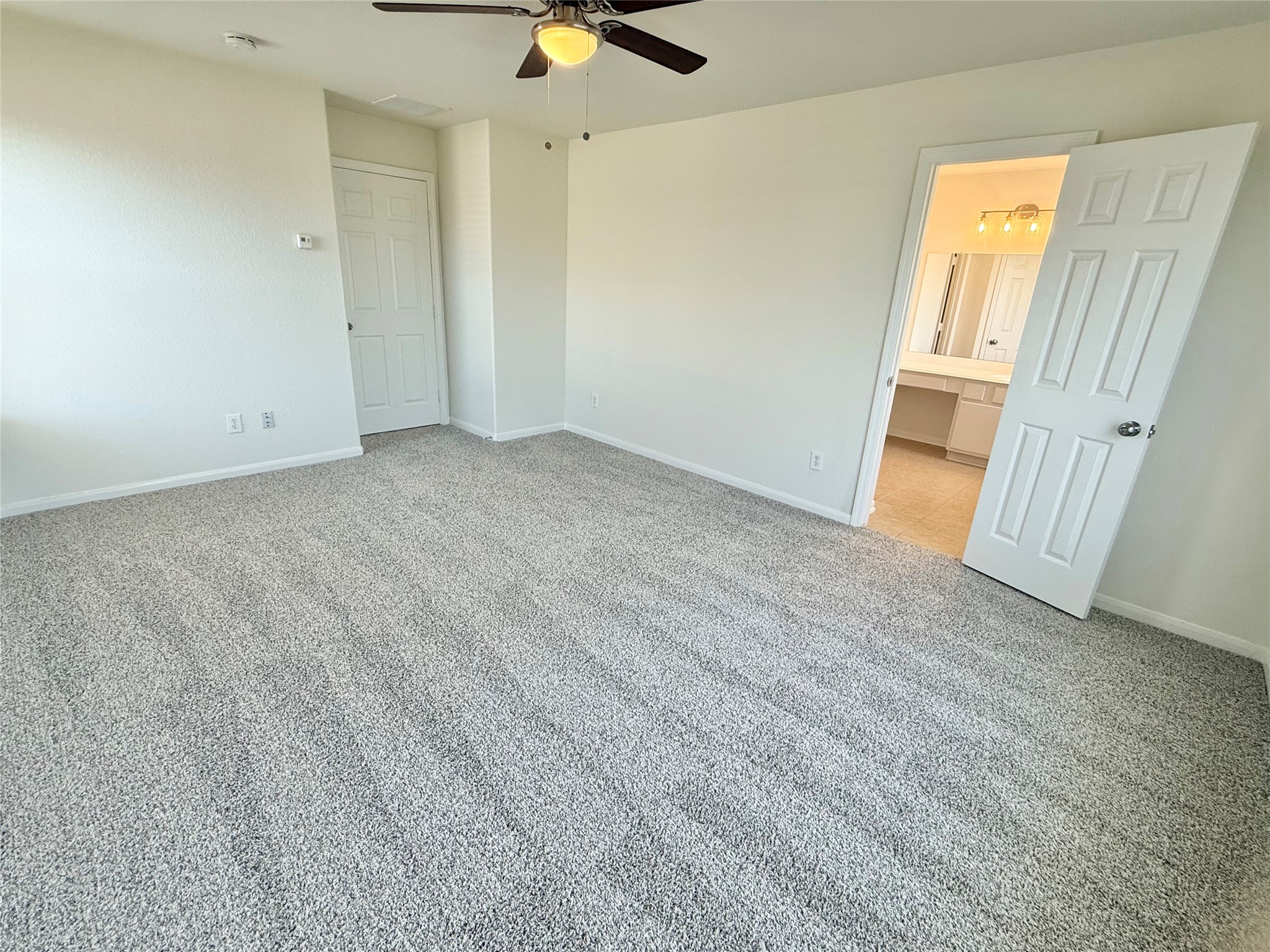3430 Falcon Trail Court Spring, TX 77373 - Photo 21 of 31 Primary bedroom with brand new carpet.