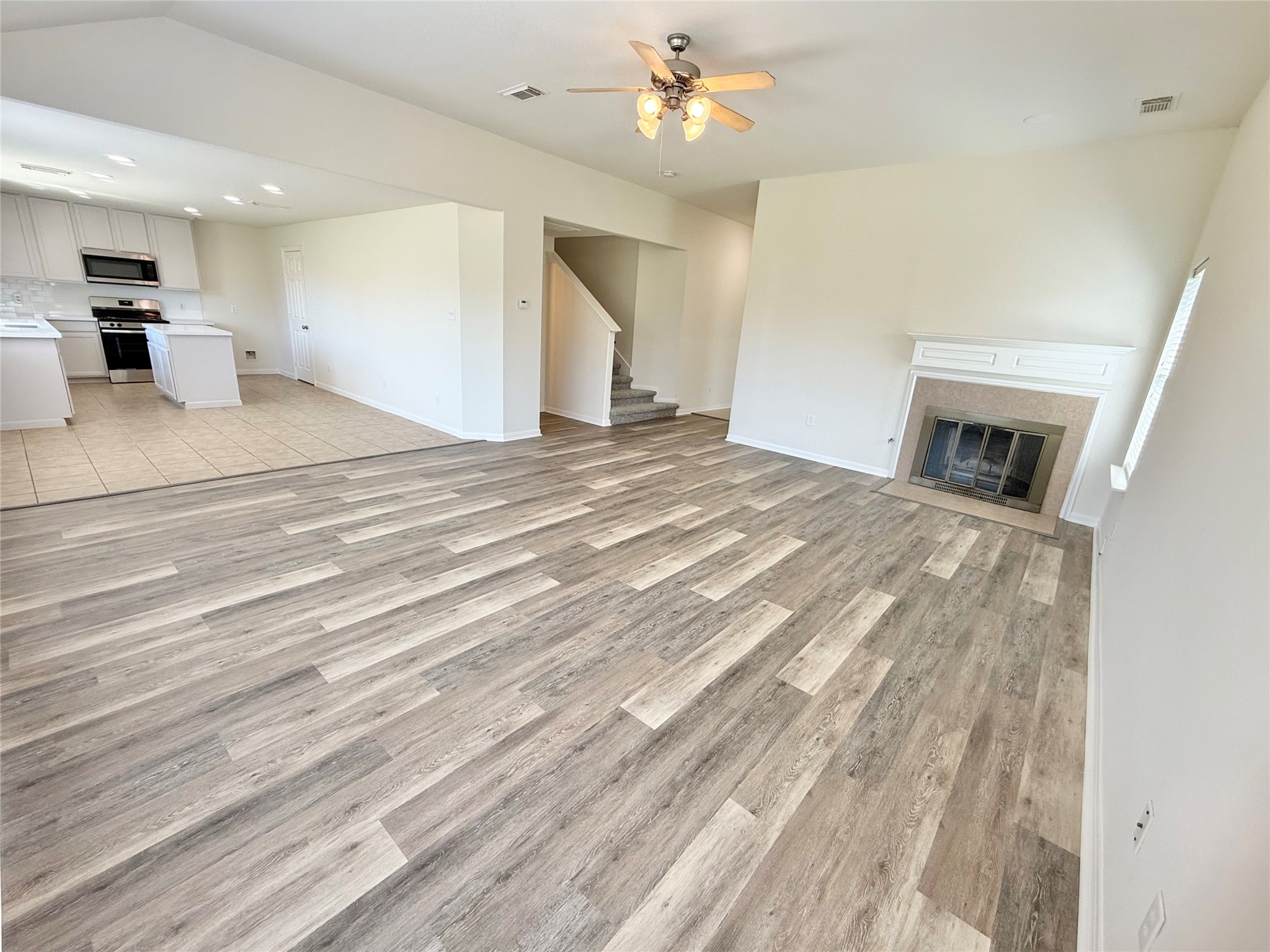 3430 Falcon Trail Court Spring, TX 77373 - Photo 5 of 31 Another view of the open-concept living room, opening up to the kitchen area.