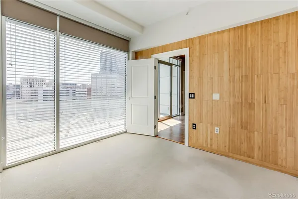 a view of a bathroom with a tub and shower