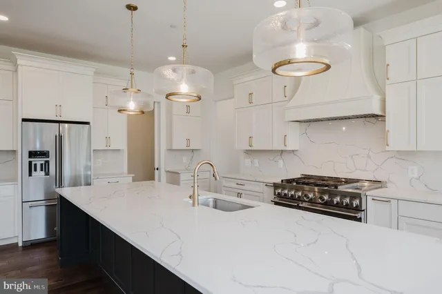 a bathroom with a shower and a sink
