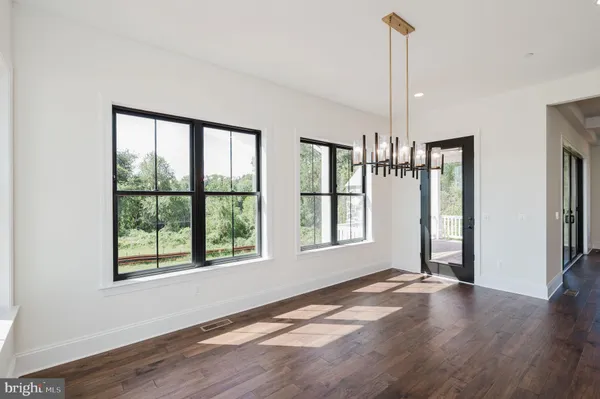 a bathroom with a sink and a window