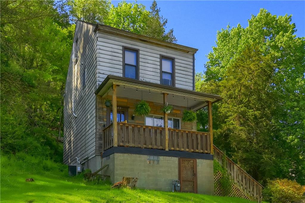 240 Mathilda Street Pittsburgh, PA 15209 - Photo 4 of 36 The front covered porch gives a great space to enjoy the morning coffee or relax at the end of a long day!