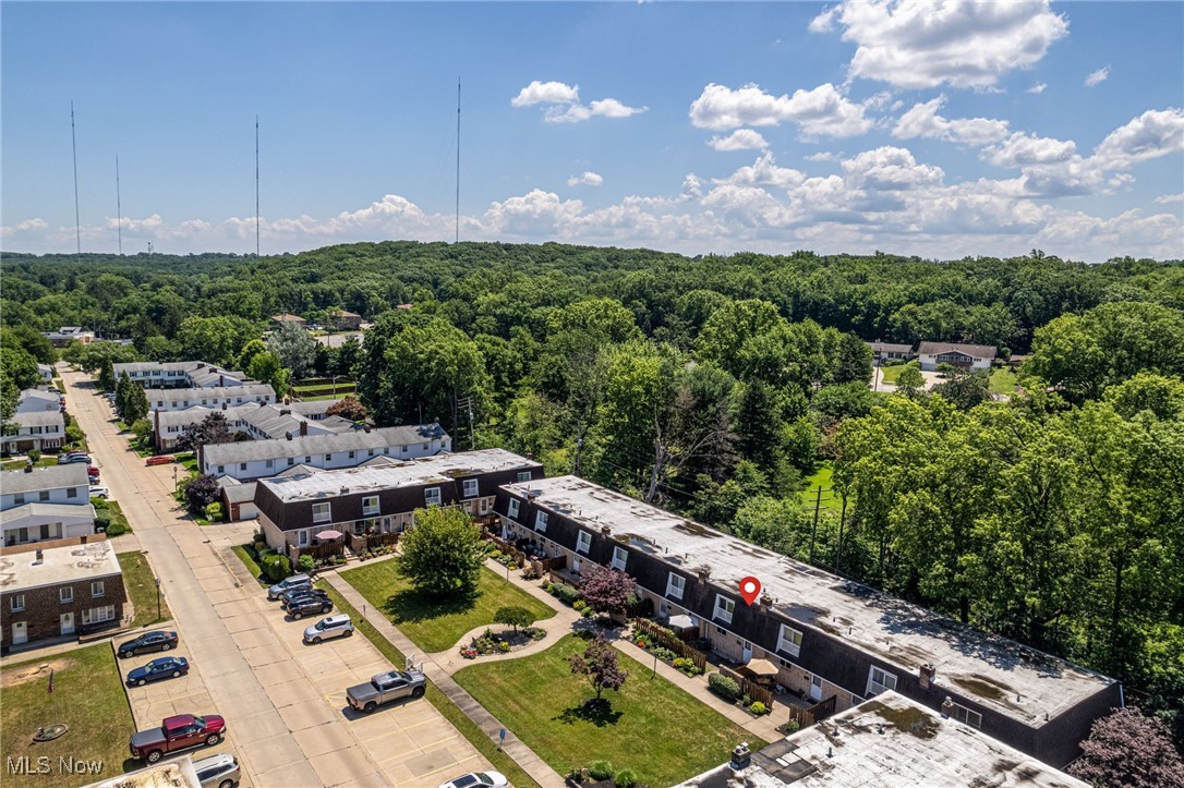 6480 State Road, Unit F7 Parma, OH 44134 - Photo 5 of 33 Drone / aerial view of a heavily wooded area