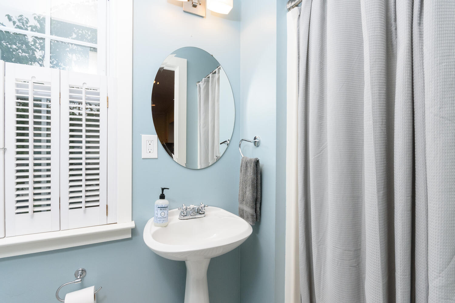 18 Patton Drive Darien, CT 06820 - Photo 16 of 35 a bathroom with a sink and a mirror