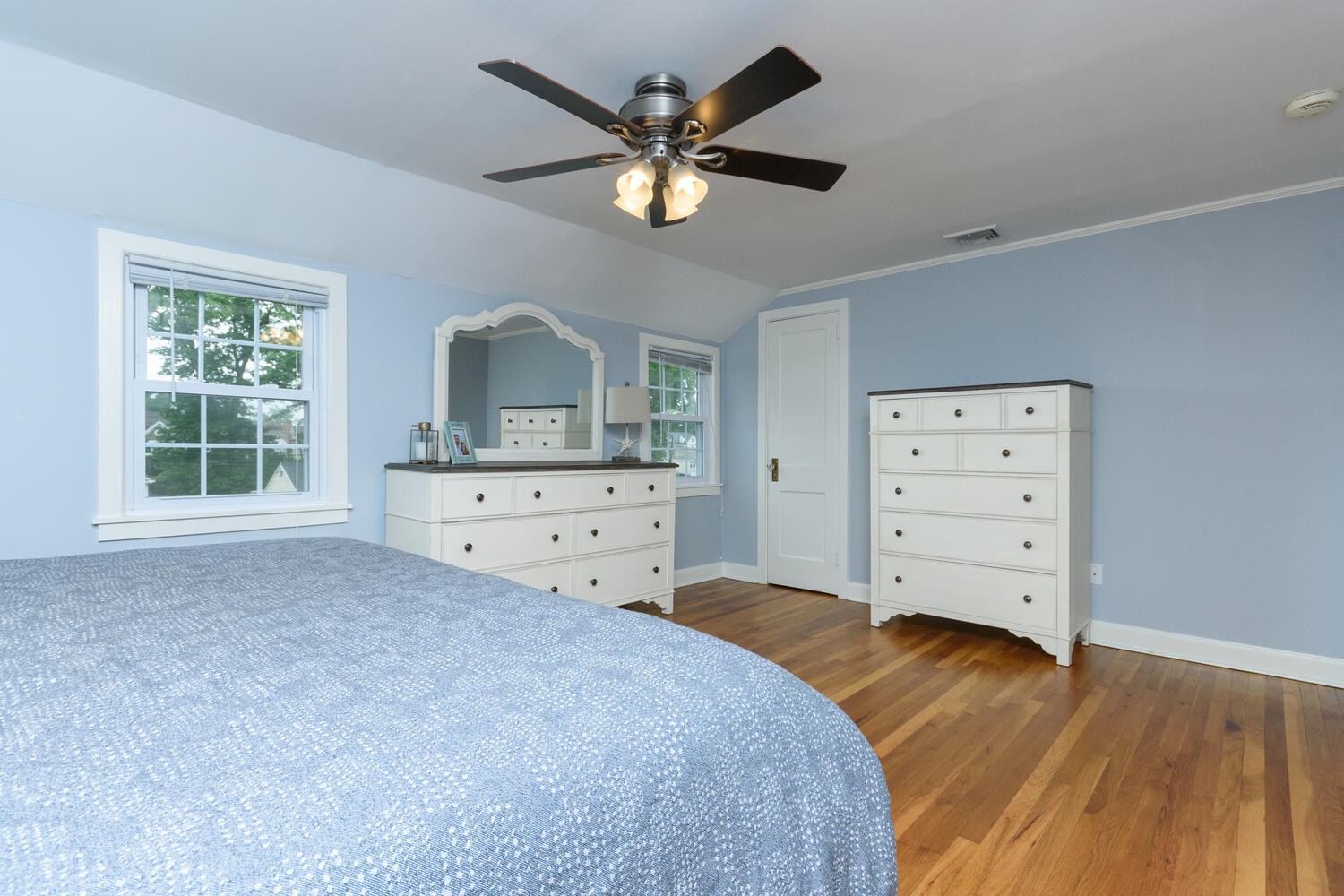 18 Patton Drive Darien, CT 06820 - Photo 18 of 35 a bedroom with a bed and a dresser