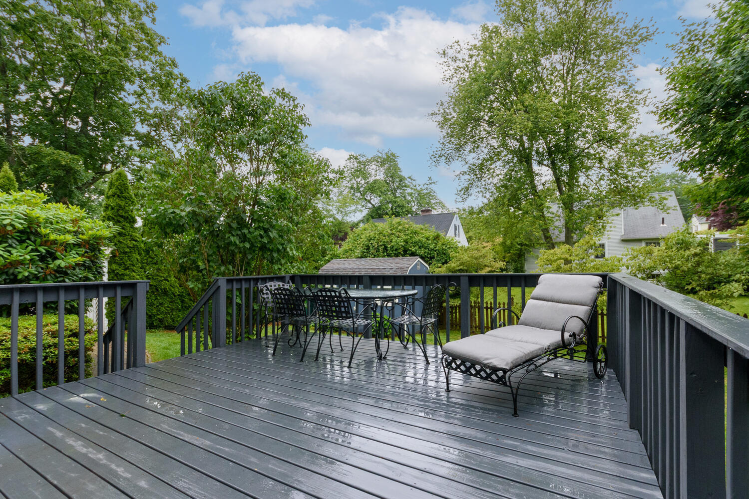 18 Patton Drive Darien, CT 06820 - Photo 28 of 35 a view of house with wooden floor outdoor seating and yard in the back