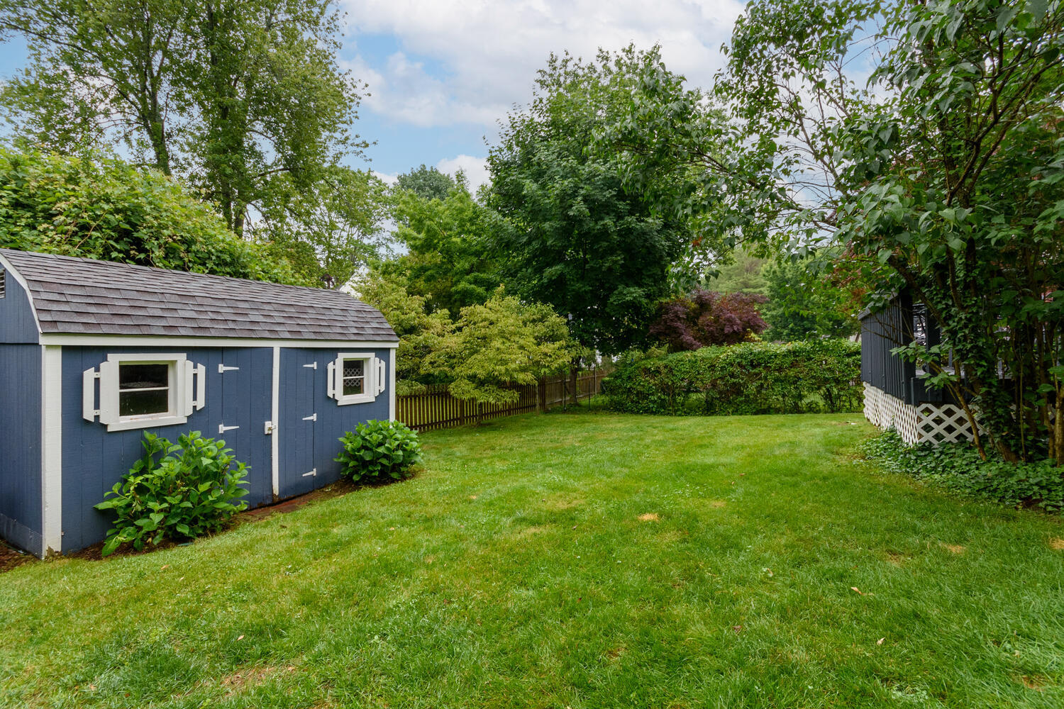 18 Patton Drive Darien, CT 06820 - Photo 32 of 35 a view of a house with a yard