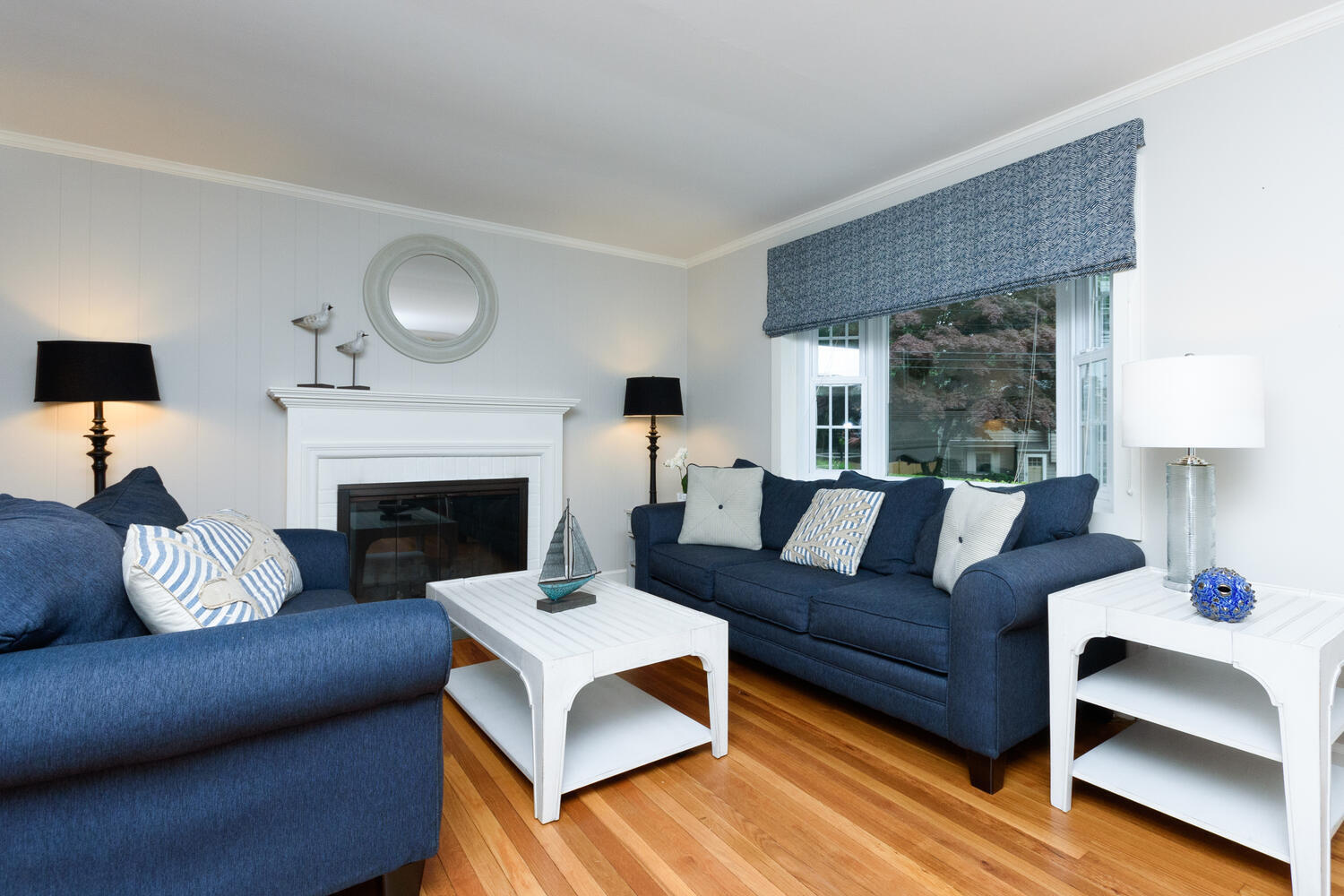 18 Patton Drive Darien, CT 06820 - Photo 5 of 35 a living room with furniture and a fireplace