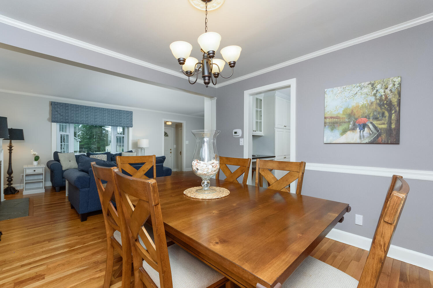 18 Patton Drive Darien, CT 06820 - Photo 7 of 35 a view of a dining room with furniture and wooden floor