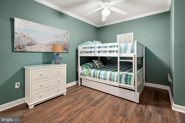 a view of a living room and kitchen