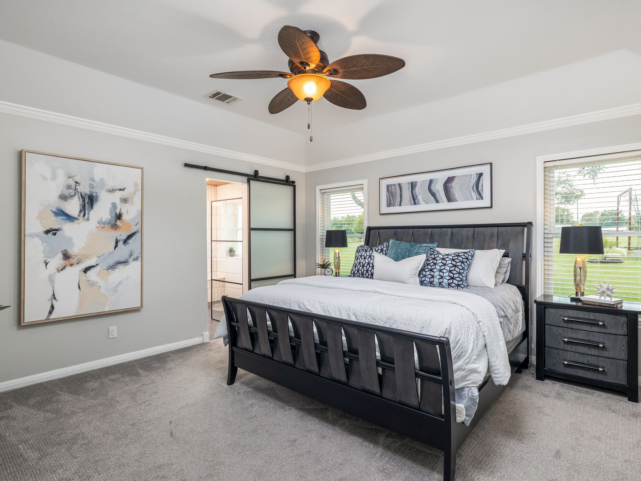 3001 County Road 255 Georgetown, TX 78633 - Photo 15 of 35 A tranquil primary bedroom with a vaulted ceiling and direct access to a private bathroom.