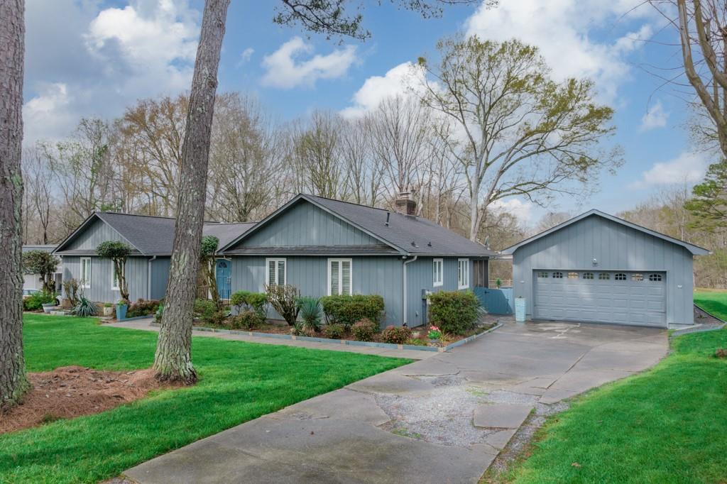 5111 Rounding Run Road Charlotte, NC 28277 - Photo 2 of 35 a front view of a house with garden
