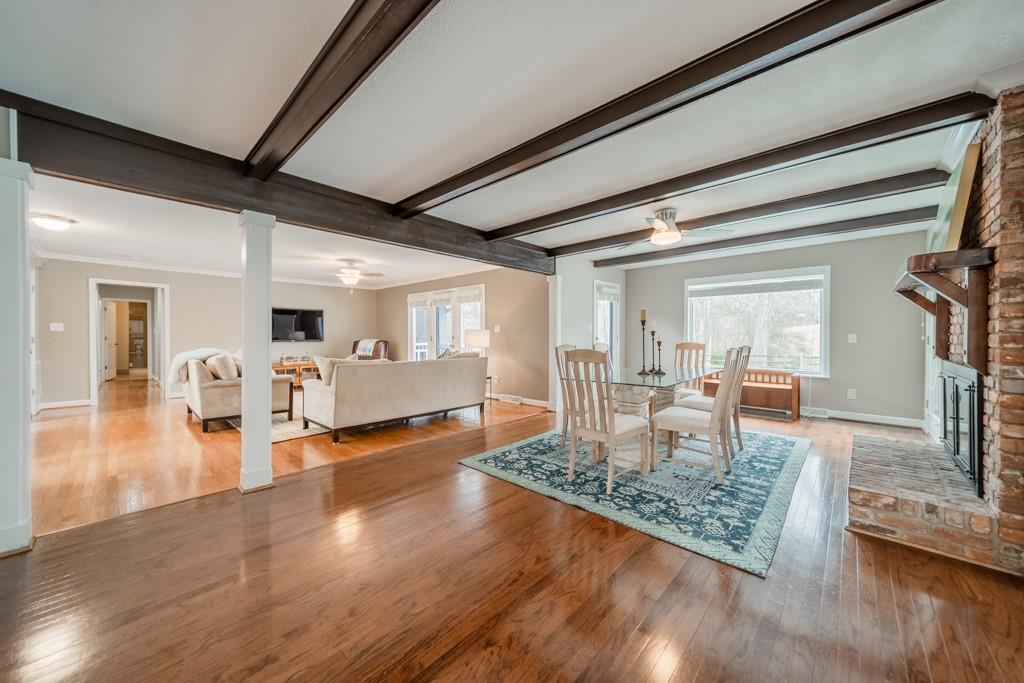 5111 Rounding Run Road Charlotte, NC 28277 - Photo 6 of 35 a living room with fireplace furniture and a wooden floor