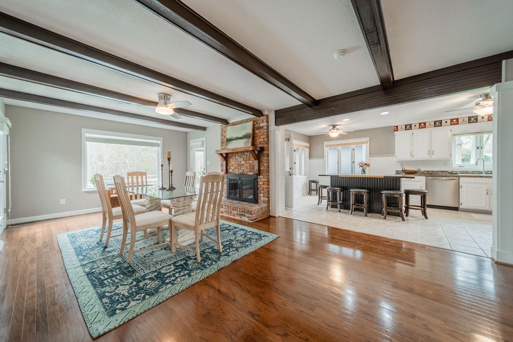 5111 Rounding Run Road Charlotte, NC 28277 - Photo 7 of 35 a dining room with furniture and wooden floor
