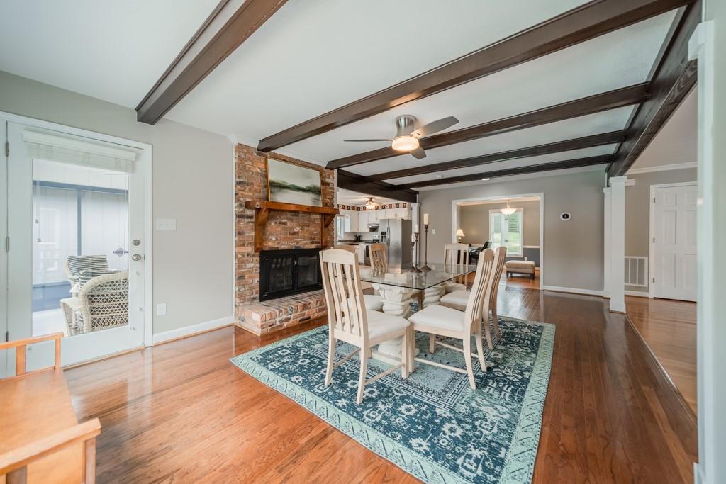 5111 Rounding Run Road Charlotte, NC 28277 - Photo 9 of 35 a dining room with furniture and wooden floor