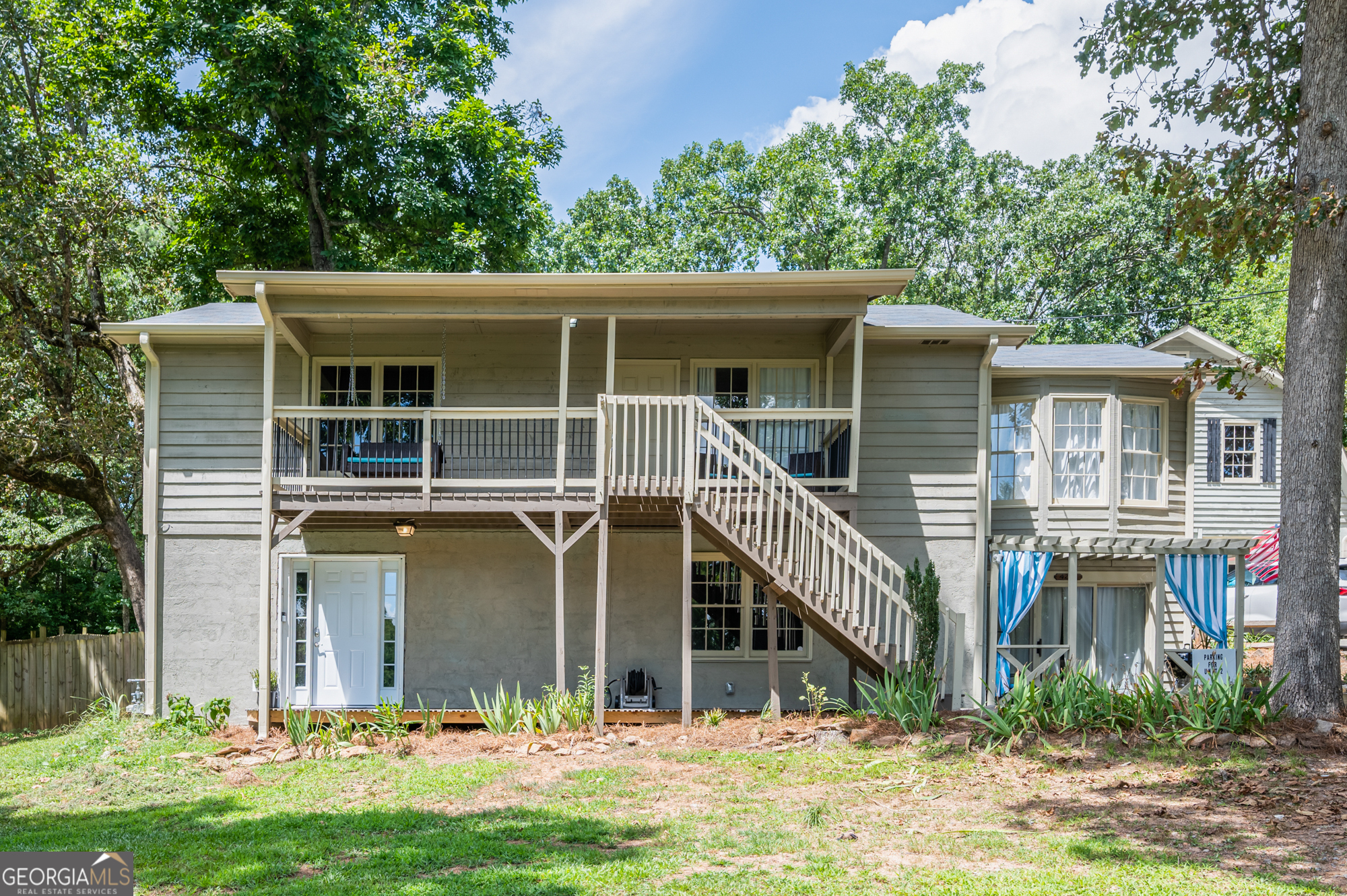 4297 Earney Road, Unit 2 Woodstock, GA 30188 - Photo 22 of 26 front view of a house with a yard