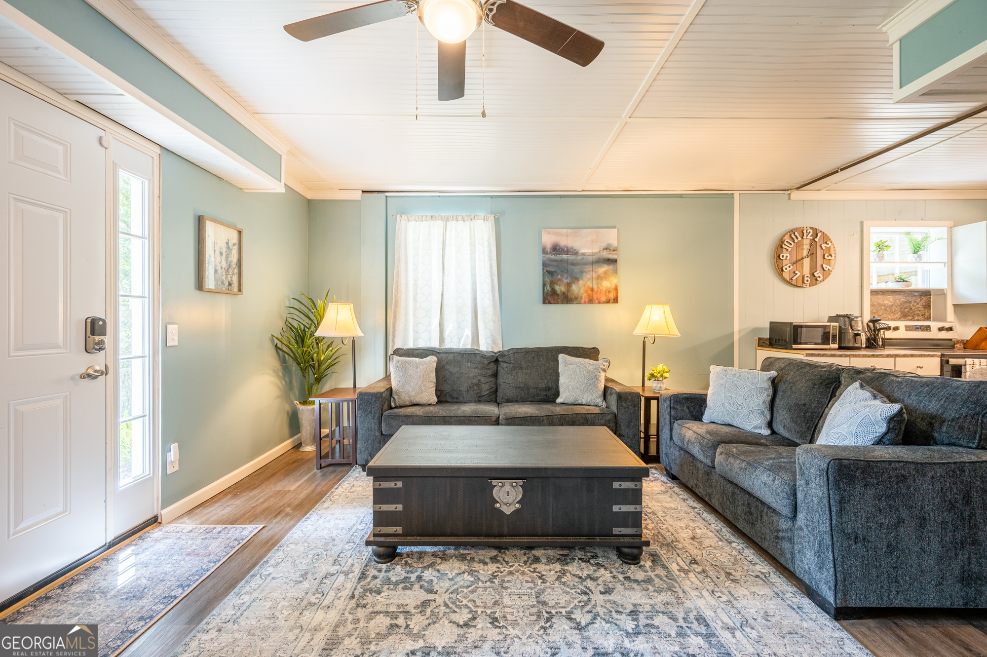 4297 Earney Road, Unit 2 Woodstock, GA 30188 - Photo 5 of 26 a living room with furniture and a rug