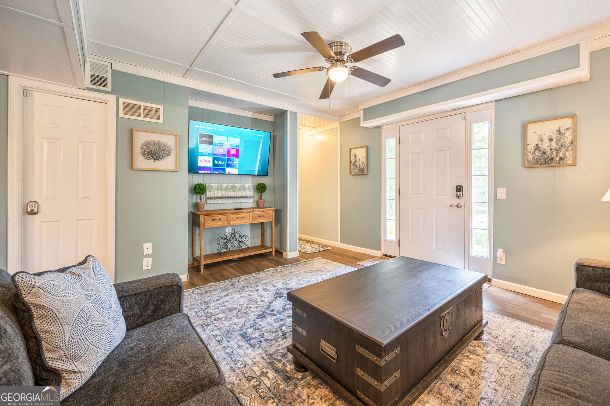 4297 Earney Road, Unit 2 Woodstock, GA 30188 - Photo 6 of 26 a living room with furniture and a flat screen tv