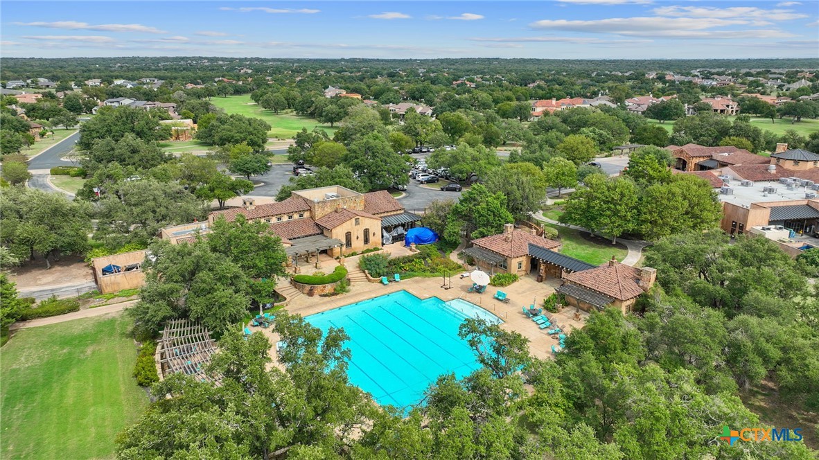 103 Water Stone Cove Georgetown, TX 78628 - Photo 11 of 14 an aerial view of residential houses with outdoor space and trees