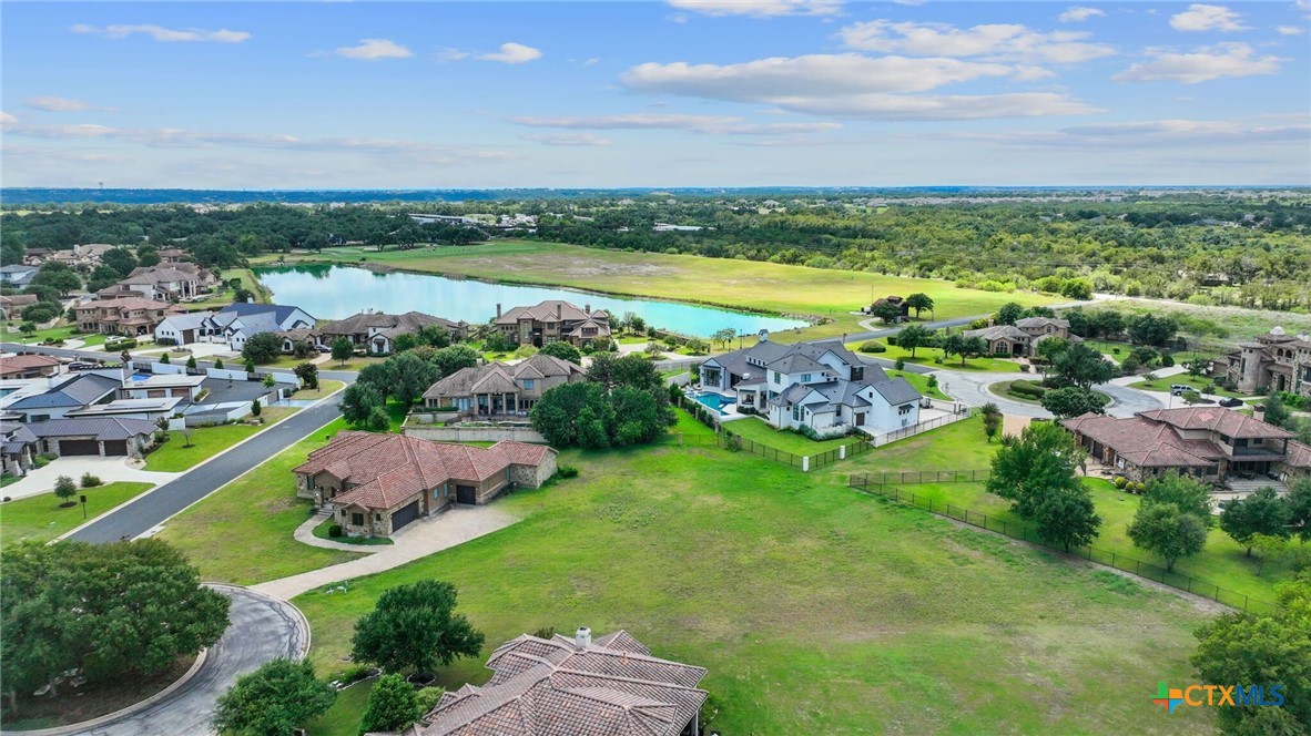 103 Water Stone Cove Georgetown, TX 78628 - Photo 2 of 14 a view of a city with mountains in the background