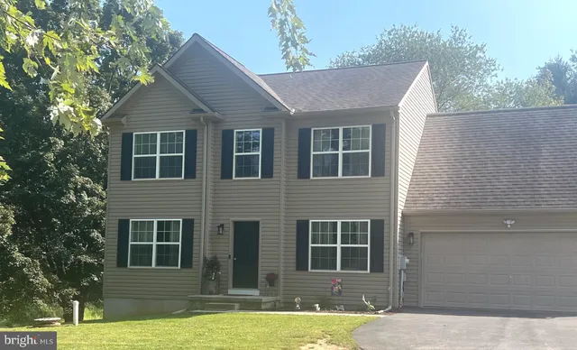 a view of a house with a swimming pool