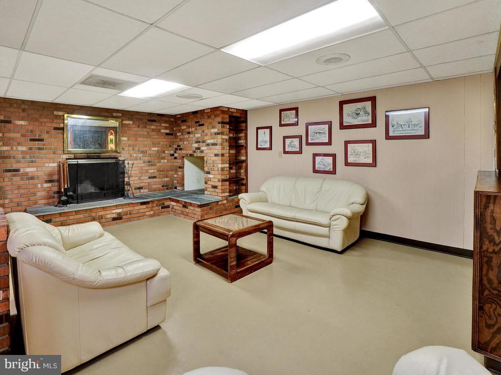 3608 Kemptown Church Road Monrovia, MD 21770 - Photo 27 of 58 Lower level family room with woodburning fireplace
