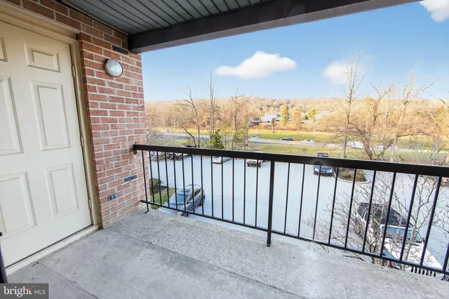 a view of a balcony with an outdoor space