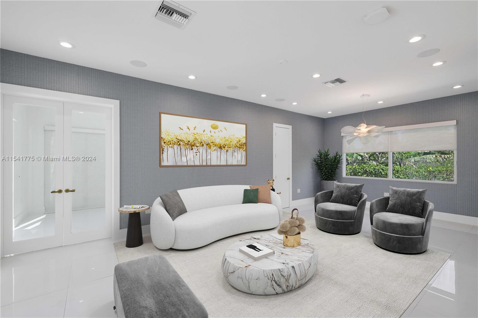 7153 Valencia Drive Boca Raton, FL 33433 - Photo 11 of 80 a living room with furniture and a large window