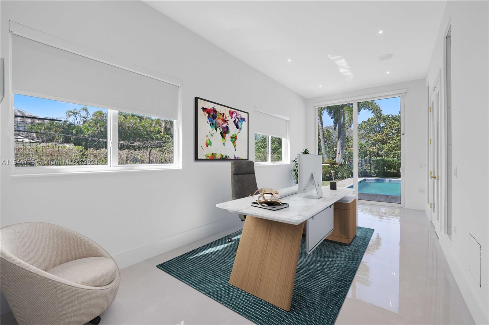 7153 Valencia Drive Boca Raton, FL 33433 - Photo 12 of 80 a living room with furniture a table and a large window