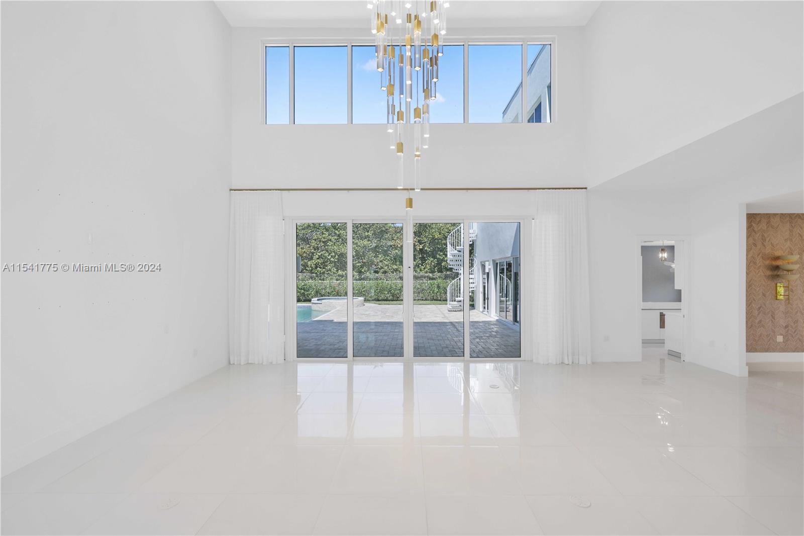 7153 Valencia Drive Boca Raton, FL 33433 - Photo 26 of 80 a view of an empty room with a window