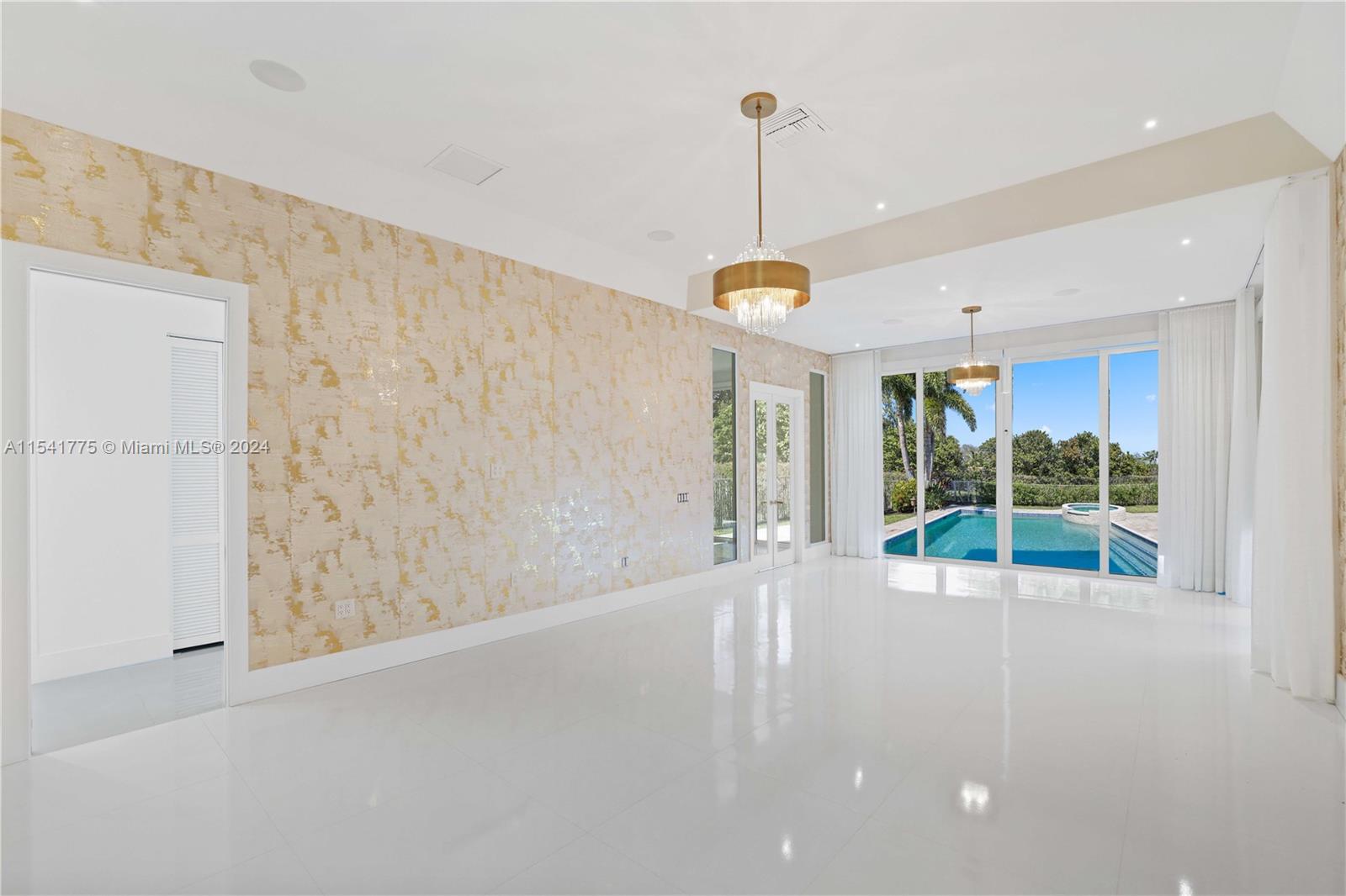 7153 Valencia Drive Boca Raton, FL 33433 - Photo 35 of 80 a view of an empty room with windows