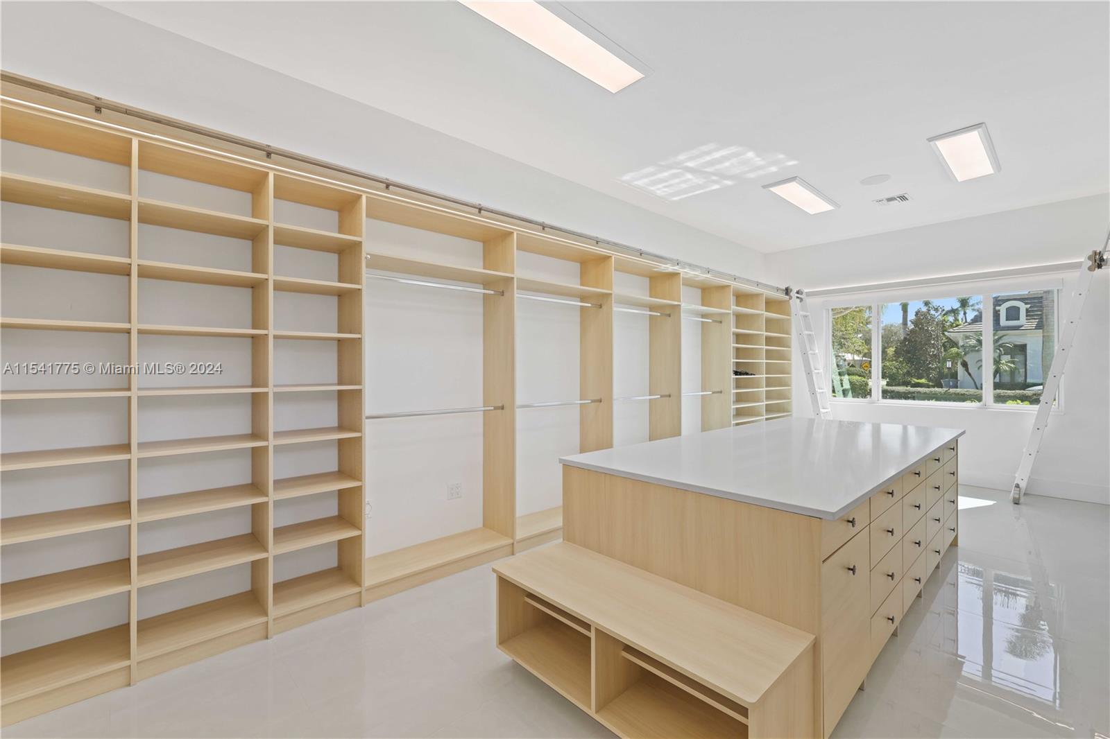7153 Valencia Drive Boca Raton, FL 33433 - Photo 42 of 80 a spacious bedroom with a bed and a window