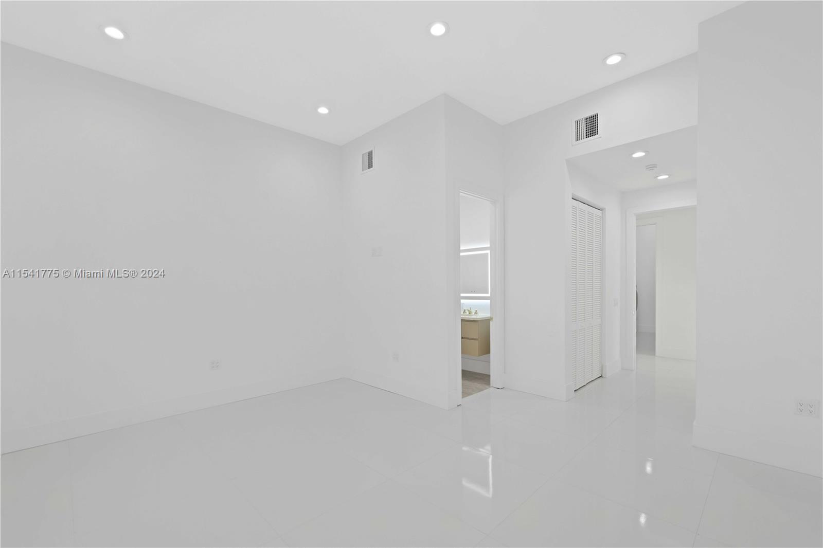 7153 Valencia Drive Boca Raton, FL 33433 - Photo 46 of 80 an empty room with a empty space