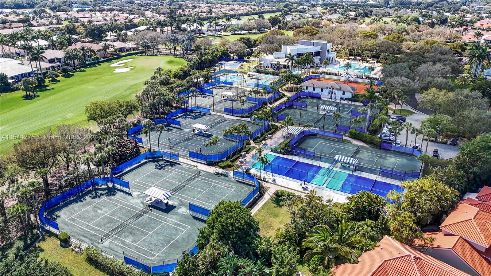 7153 Valencia Drive Boca Raton, FL 33433 - Photo 67 of 80 an aerial view of residential houses with outdoor space and swimming pool