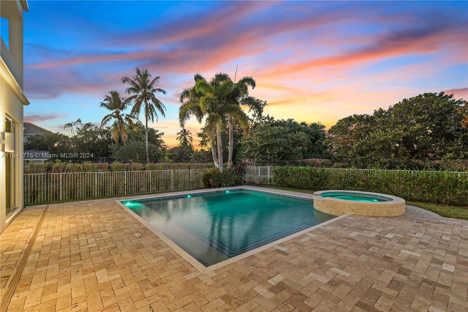 7153 Valencia Drive Boca Raton, FL 33433 - Photo 79 of 80 a view of swimming pool that has a yard