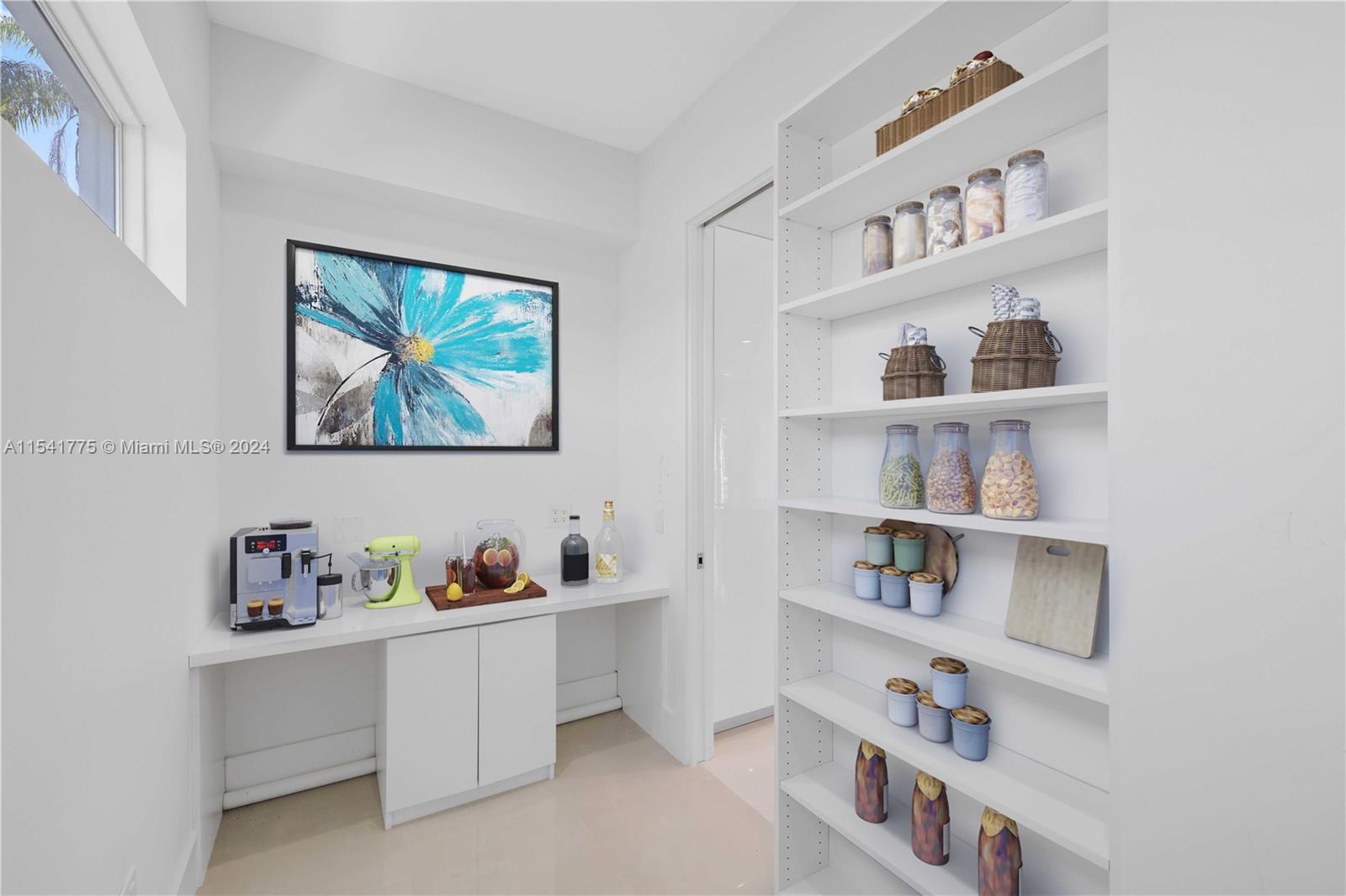 7153 Valencia Drive Boca Raton, FL 33433 - Photo 10 of 80 a room with a book shelf and a book shelf