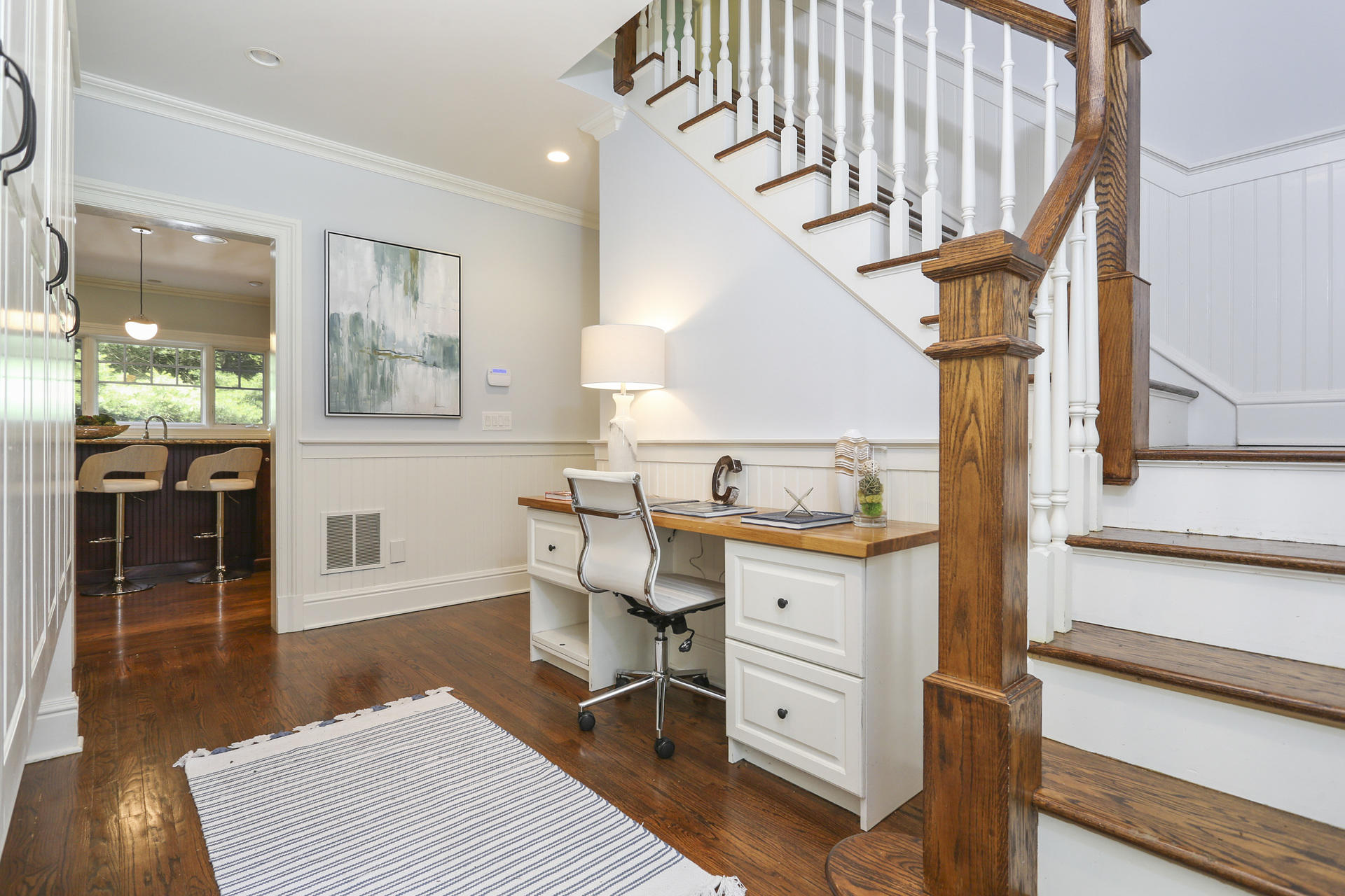 299 Ridgefield Road Wilton, CT 06897 - Photo 11 of 29 a living room with furniture a rug and white walls