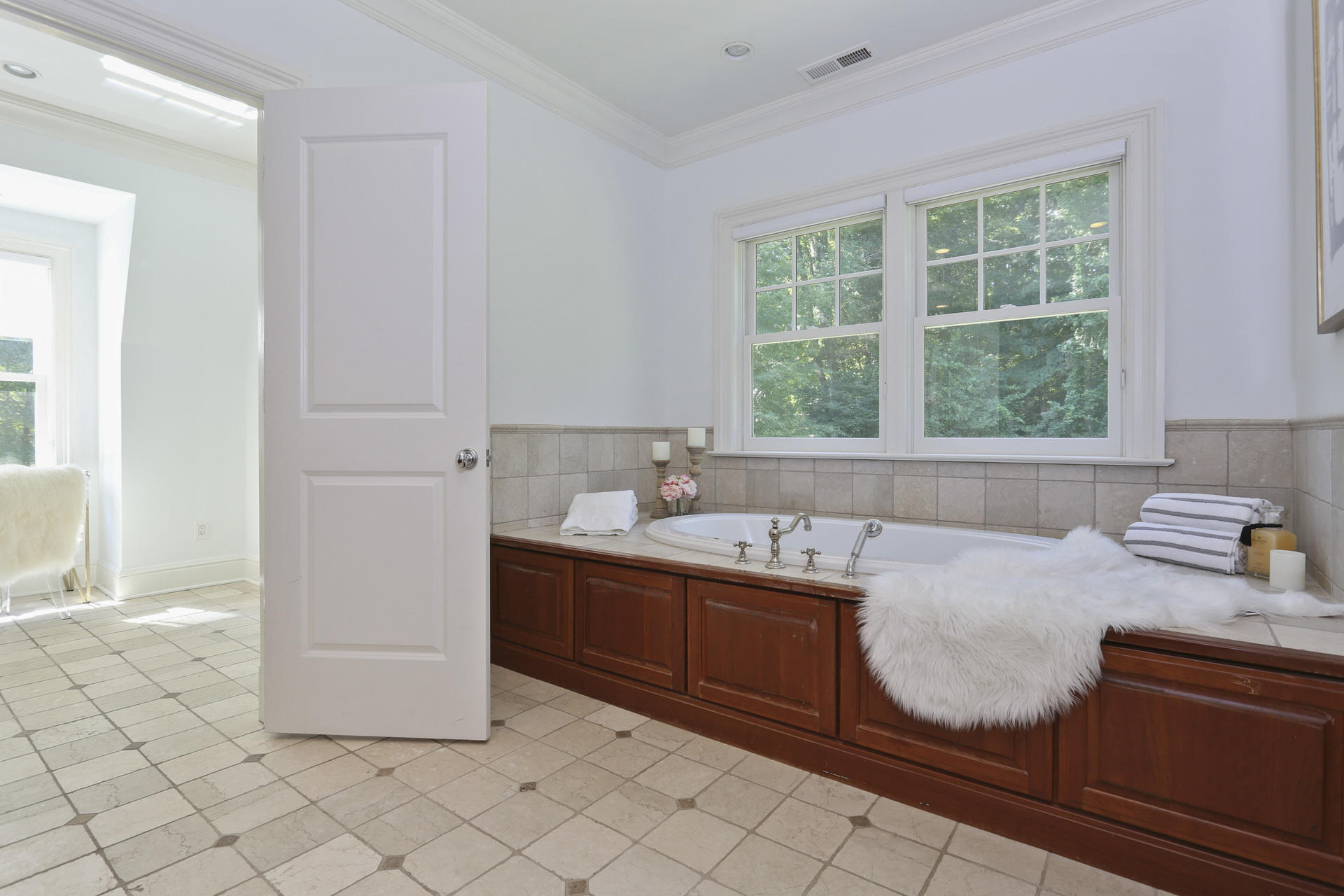 299 Ridgefield Road Wilton, CT 06897 - Photo 16 of 29 a kitchen with a sink cabinets and window